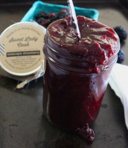 a jam jar of blackberry jam