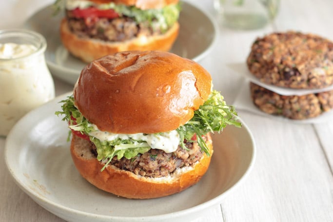 Vegan glutenfree Black Bean Shiitake Burger served with a dollop of Hatch Chile Mayonnaise