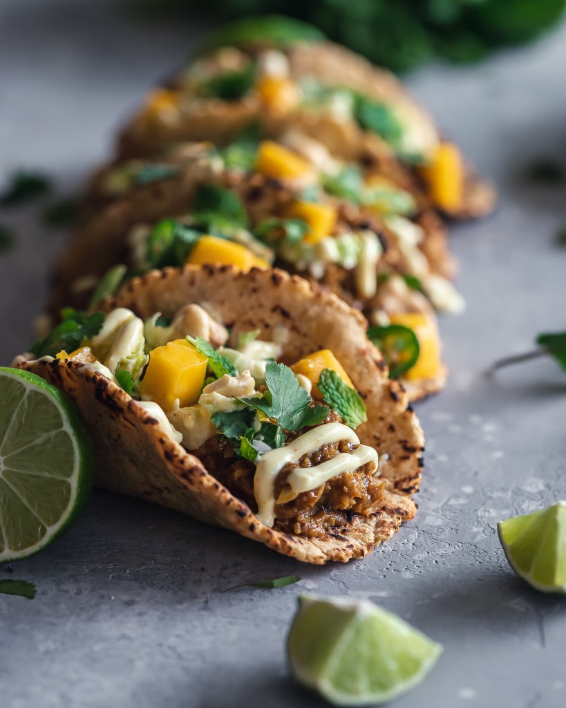 close-up of vegan Thai Curry Tacos with veggie grounds and dairy-free crema