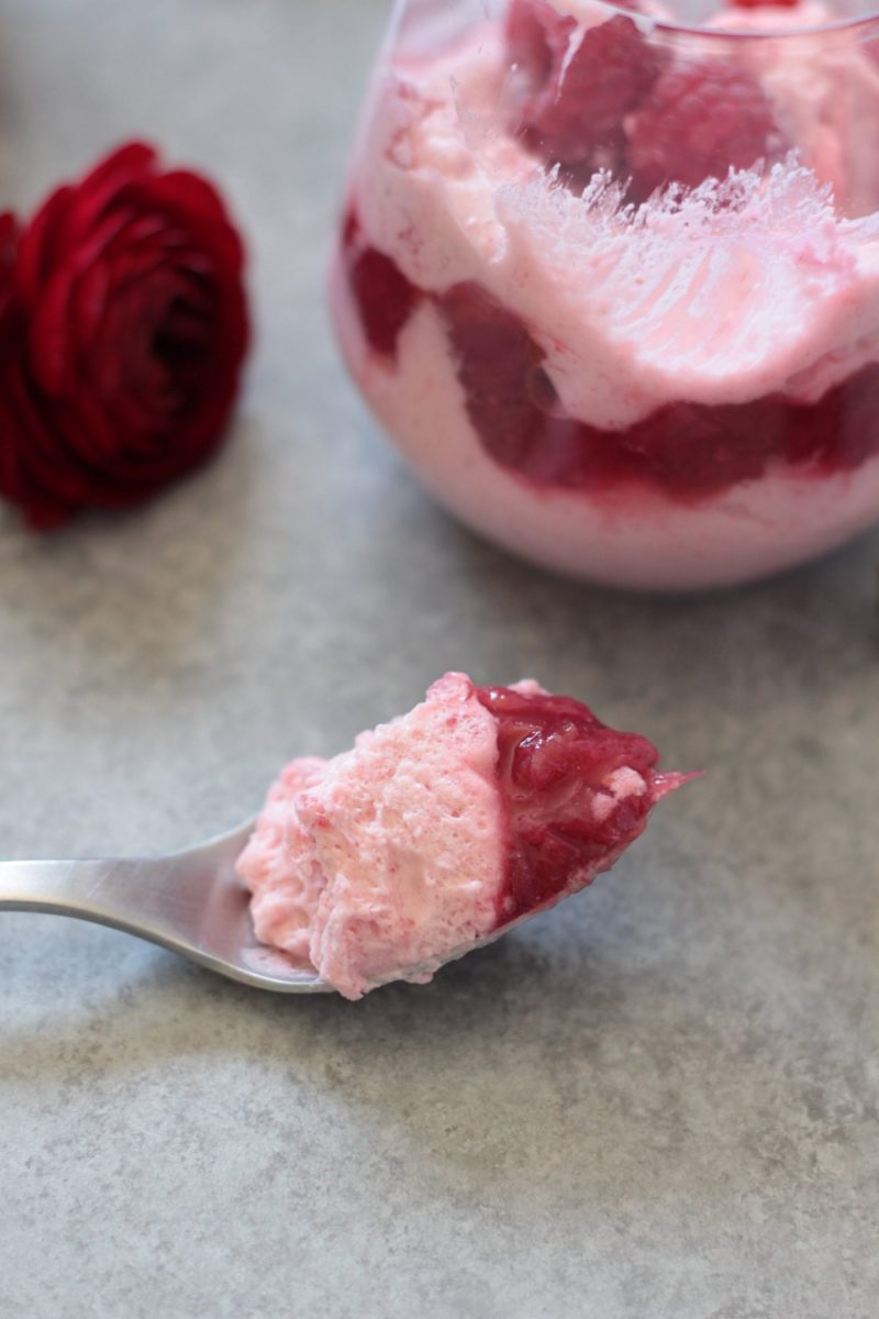 raspberry mousse a spoong with Raspberry Mousse made with egg white and some rhubarb compote
