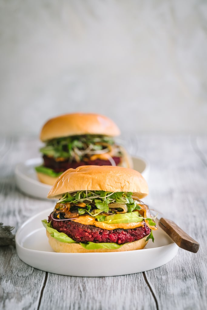 Beet Chickpea Burgers on white plates