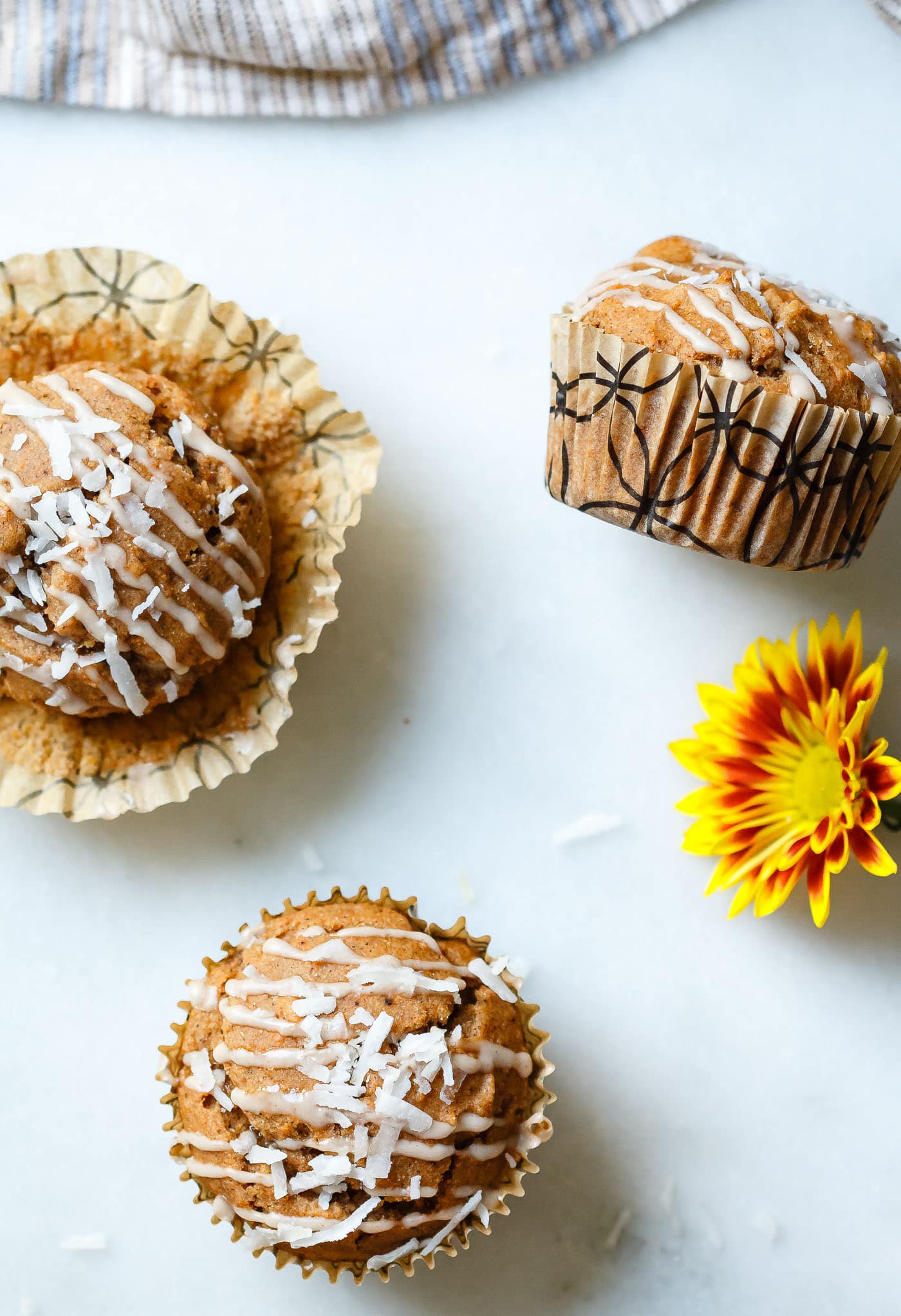 overhead shot of three Sweet Potato Coconut Chai Muffins
