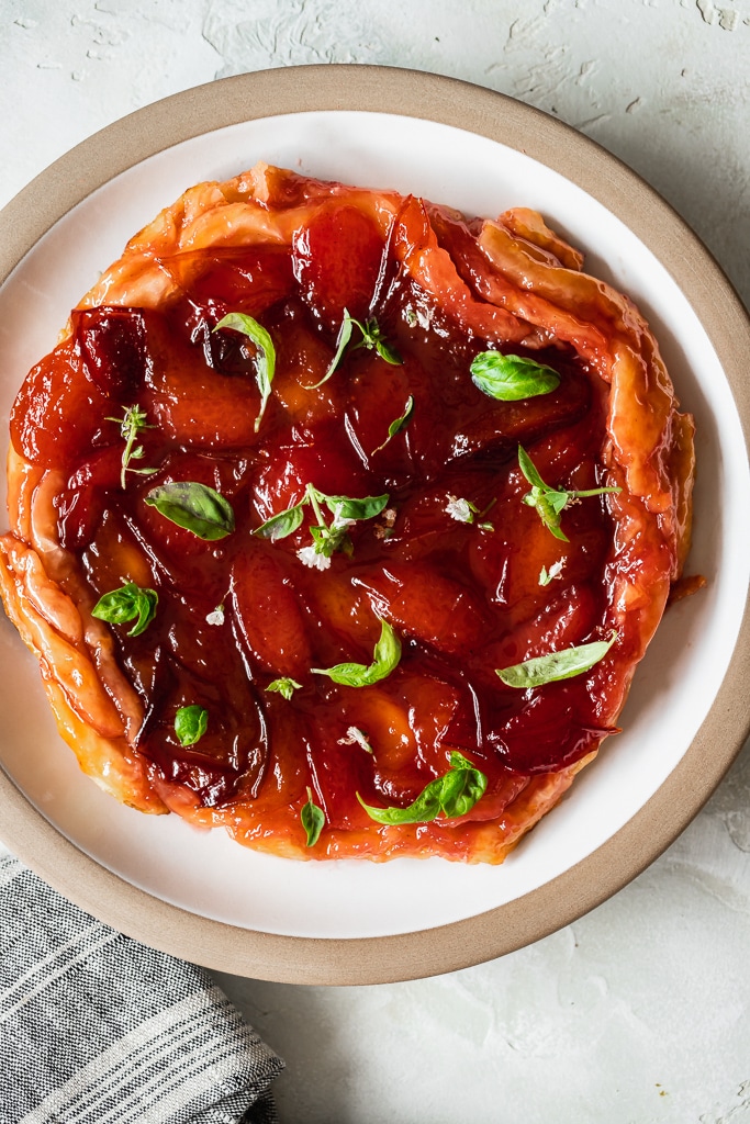 overhead shot of Easy Tarte Tatin with Plums and Basil