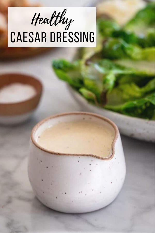Healthy Caesar Dressing | I've been making this bright and healthy Caesar dressing for years. It's lightened with Greek yogurt and packs in loads of lemony, garlicky flavor. Serve it with a salad as a healthy side for your Thanksgiving meal #dressing #caesar #healthy #lowcal #saladdressing