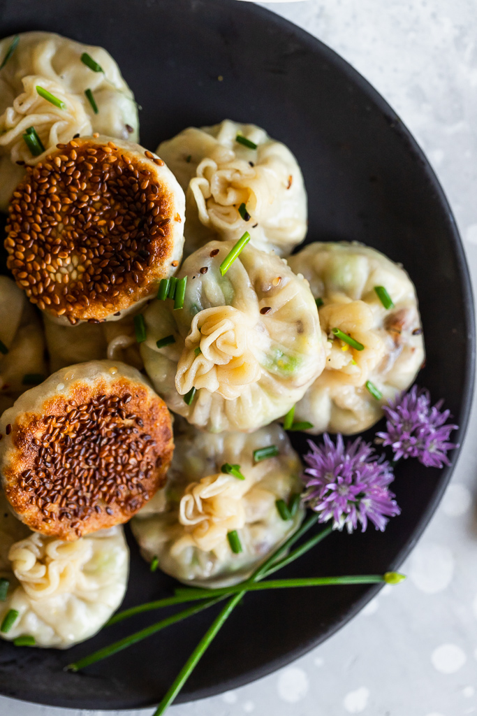 a close up shot of round mushroom dumplings