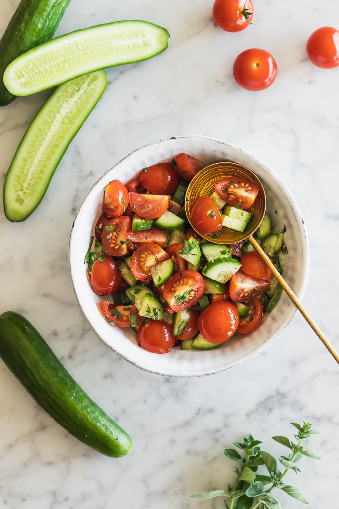 cucumber tomato salsa in a small white bowl 
